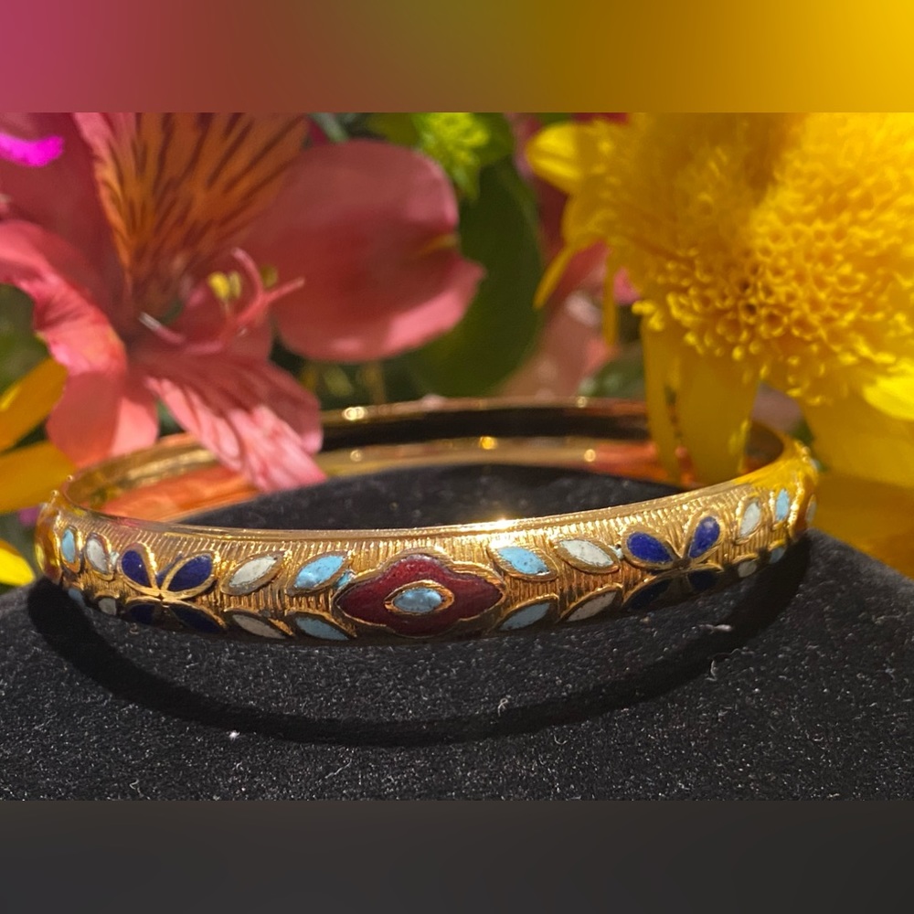 Vintage gold tone bangle with enamel